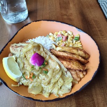 Baobab Fare - Fish with corn, cabbage and rice. - Coffee & Tea Near Me - Detroit, Michigan Baobab Fare - Fish with corn, cabbage and rice. - Coffee & Tea Near Me - Detroit, Michigan