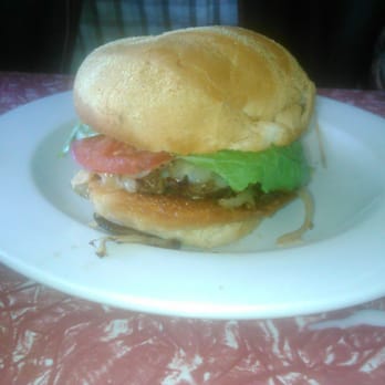 The Diner House 29 - Oklahoma Griddle burger with Monterey Jack cheese, fried onions on a buttered grilled bun with lettuce and tomato. - Breakfast & Brunch Near Me - St. Catharines, Ontario The Diner House 29 - Oklahoma Griddle burger with Monterey Jack cheese, fried onions on a buttered grilled bun with lettuce and tomato. - Breakfast & Brunch Near Me - St. Catharines, Ontario