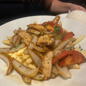 La Perla - Lomo saltado with chicken - Latin American Near Me - Miami, Florida
