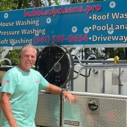 BubbleUp Exterior Cleaning - Mac in front of his impressive rig.