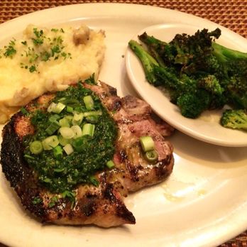 Comfort Kitchen & Bar - Amazing pork chop with chimichurrri - American Near Me - Huntington, Massachusetts Comfort Kitchen & Bar - Amazing pork chop with chimichurrri - American Near Me - Huntington, Massachusetts