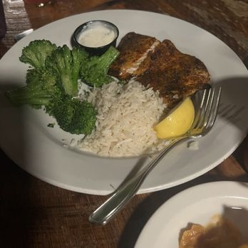 The Conch House Restaurant - Mahi. Blackened with rice and broccoli - Caribbean Near Me - Saint Augustine, Florida