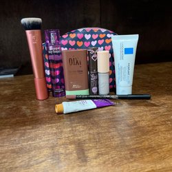 Ulta Beauty - the purple little bottle of perfume is so cute & easy for on the go too
