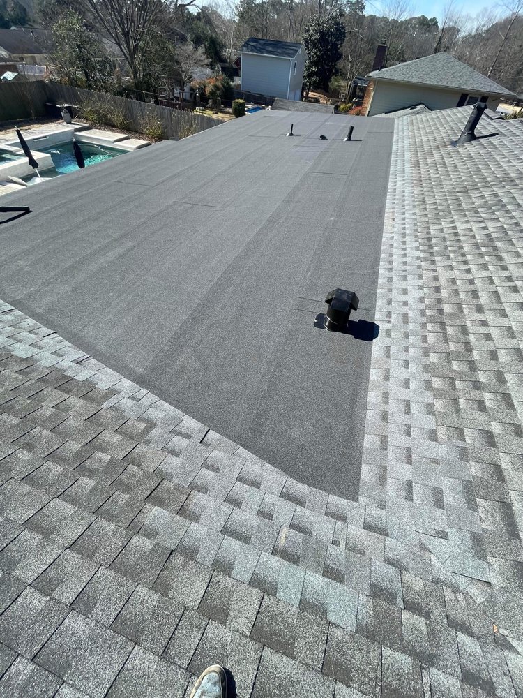 Slide of Rico’s Roofing Restorations