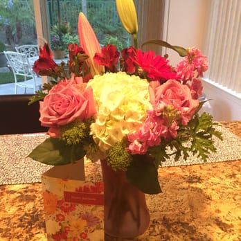 Cheers Floral Creations - So lovely! My boyfriend's kitchen has a light right above the table so it made a nice spotlight for the flowers haha B) - Florists Near Me - Lake Forest, California Cheers Floral Creations - So lovely! My boyfriend's kitchen has a light right above the table so it made a nice spotlight for the flowers haha B) - Florists Near Me - Lake Forest, California