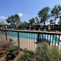 Pool 5' deep. Lots of chairs and tables. Pool 5' deep. Lots of chairs and tables.