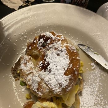 Bistro Cafe - Croissant with scrambled eggs bacon , topped with powdered sugar and dab of honey - Breakfast & Brunch Near Me - Miami, Florida