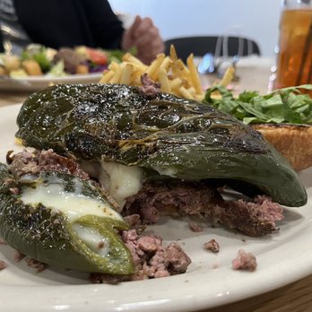 Filos Tavern - Freshly ground angus beef burger, topped with cheese filled poblano pepper on a homemade, toasted bun. - American Near Me - Winchester, Tennessee