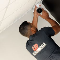 Installing our cameras, security is a must get, all of your security needs today.