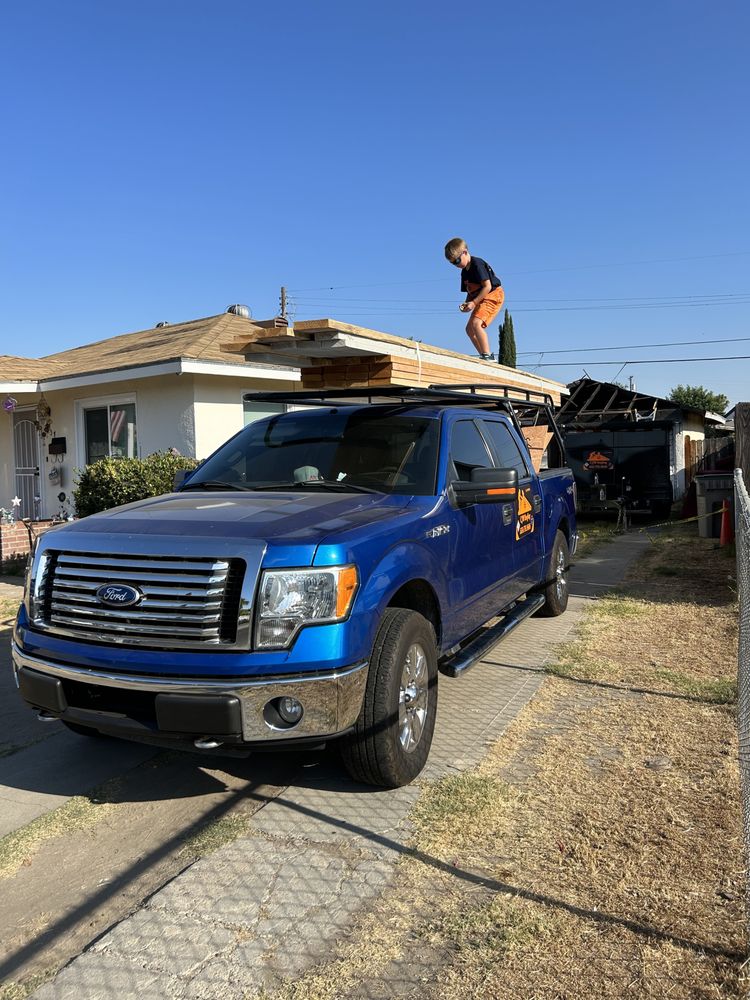 Slide of CJM Roofing