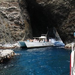 Makana Charters and Tours - Both of our boats entering multiple sea caves