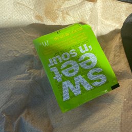 a green packet of food a green packet of food