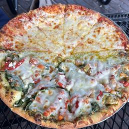 Half 4 cheese and half chicken pizza