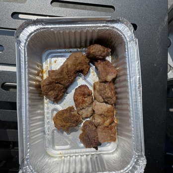 Nurlan Uyghur Restaurant 诺兰饭店 - a tray of food - Halal Near Me - Flushing, New York