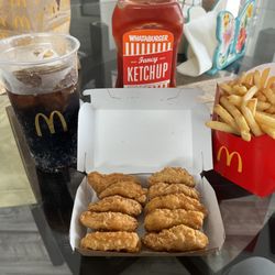 McDonald's - Always delicious food and made correctly. Friendly service and look at this 5 star presentation with my nugs in the box!!