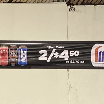 Chevron - two cans of energy drink on a sign - Gas Stations Near Me - Homewood, Alabama