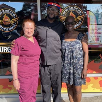 WM Burger Shack & Wings - My galpal, Jennine and I with the owner, William standing outside his restaurant on main street in Bayshore - American Near Me - Bay Shore, New York