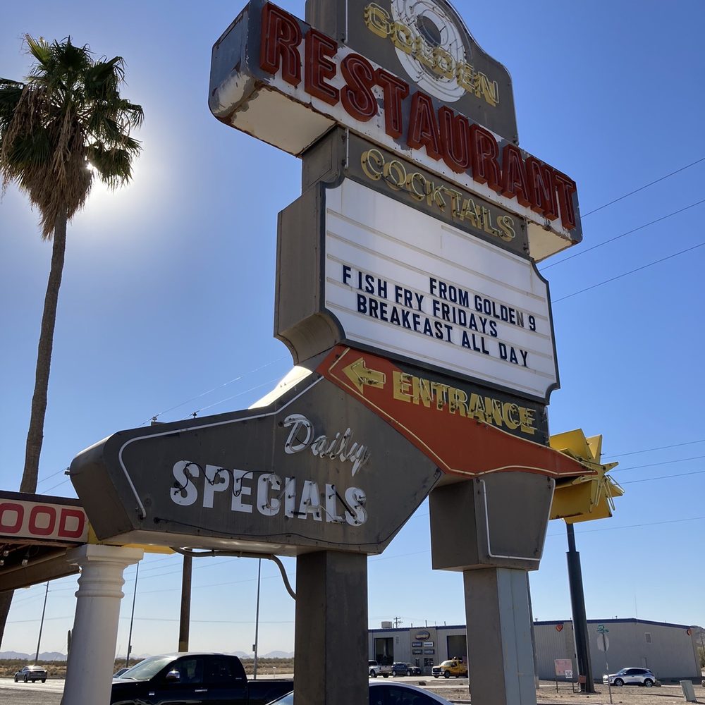 the neon sign for the restaurant