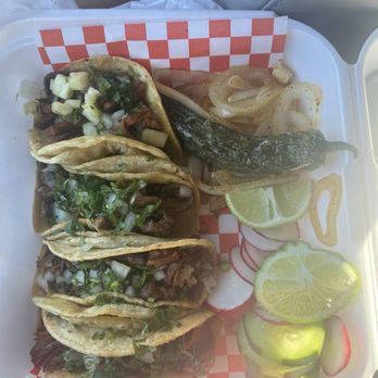 Los TacoAches - top to bottom: al pastor, carne asada, barbacoa, suadero - Food Trucks Near Me - Aurora, Colorado