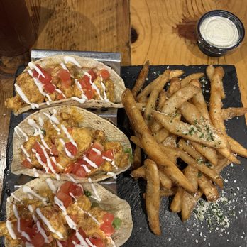 The Tradewinds Pub - Bang Bang Shrimp Tacos Garlic Fries - Irish Pub Near Me - Reedley, California The Tradewinds Pub - Bang Bang Shrimp Tacos Garlic Fries - Irish Pub Near Me - Reedley, California