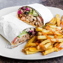 Shawarma Times & Grill - Our famous chicken shawarma wrap and freshly cut french fries!