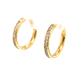 Millenia Jewelers - Yellow gold diamond hoop earrings.