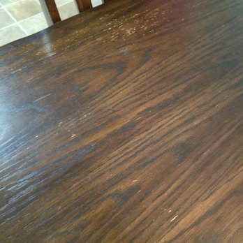 Ashley Outlet - Pic of tabletop finish that started coming off within 2 months - Furniture Stores Near Me - Hixson, Tennessee