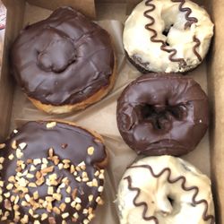 Quality Dairy - Assorted donuts and frosted cinnamon rolls