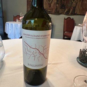 Hyeholde Restaurant - Our wine selection with some decor and seating arrangements in the background. - New American Near Me - Coraopolis, Pennsylvania Hyeholde Restaurant - Our wine selection with some decor and seating arrangements in the background. - New American Near Me - Coraopolis, Pennsylvania