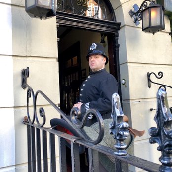 The Sherlock Holmes Museum - The "Bobby" guarding the door. - Museums Near Me - London, XGL
