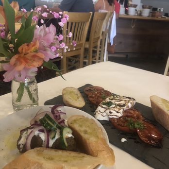 Humble Wine Bar - Left (lamb meatballs) Right (burrata) - Wine Bars Near Me - Lakewood, Ohio Humble Wine Bar - Left (lamb meatballs) Right (burrata) - Wine Bars Near Me - Lakewood, Ohio