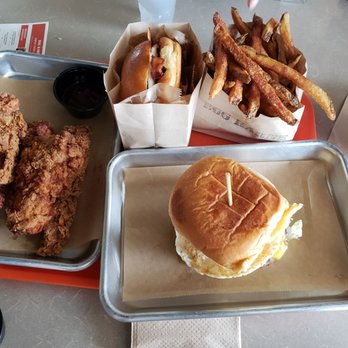 Egg Karne - EK Deluxe Burger (bottom right), Large Fries (top right), Applewood Bacon Cage Free Egg Cheese on Brioche, and Chicken Tenders. - Breakfast & Brunch Near Me - Herndon, Virginia