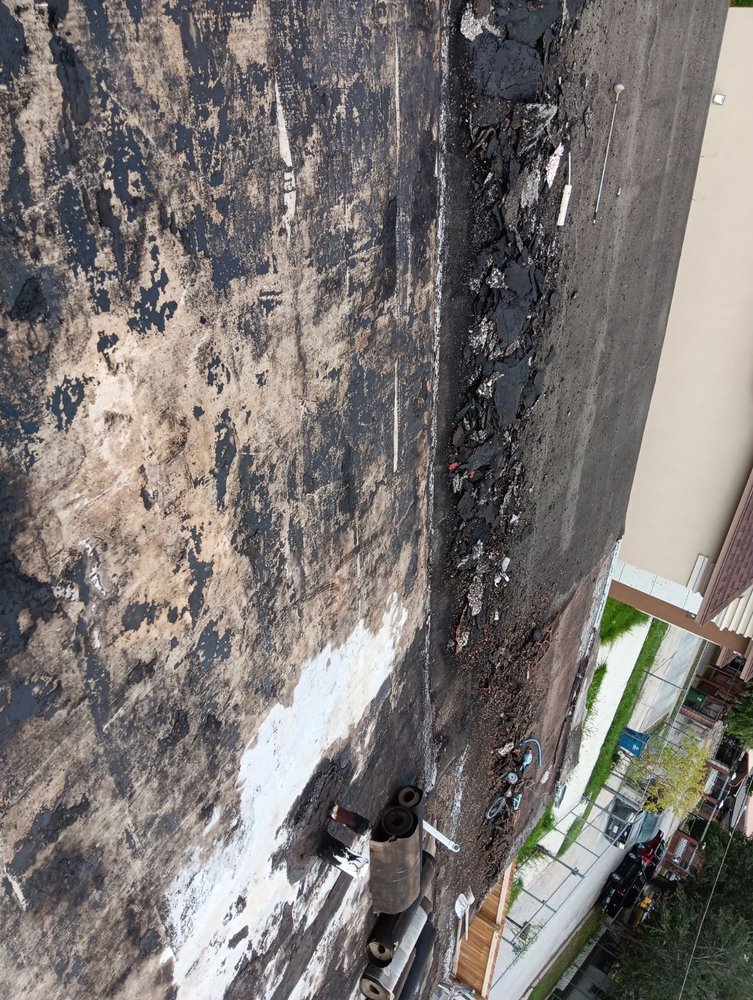 Slide of Rubio R Roofing