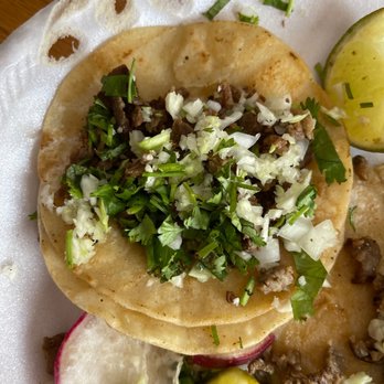 The Wild Taco - two tacos on a paper plate - Tacos Near Me - Richland, Washington The Wild Taco - two tacos on a paper plate - Tacos Near Me - Richland, Washington