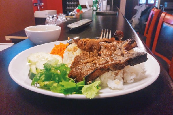Photo of Long Bay - New York, NY, US. Pork Chops over rice.