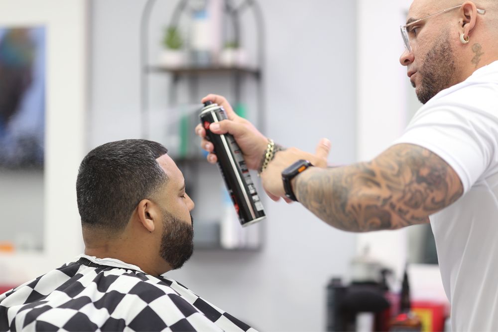 Xclusiv Barber Lounge Logo