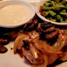 Smothered Chicken with the cream gravy on the side Smothered Chicken with the cream gravy on the side