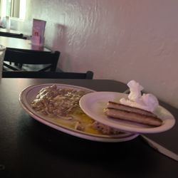 Captain's Cabin  Bar - Brownish gravy and microwaved sausage.... No thank you
