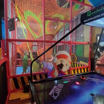 Funtania - Rope playground hanging so low from ceiling that kids can't get out of the bottom without lifting ropes up. - Amusement Parks Near Me - Orlando, Florida