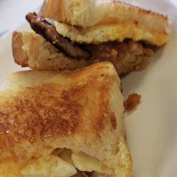 Cafe Miro - Sausage, egg, cheese and tater tot breakfast sandwich. - Cafes Near Me - Westminster, California
