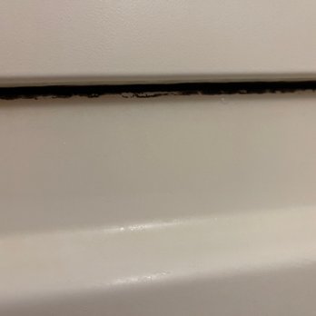 Super 8 by Wyndham Kelso Longview Area - Don't take a bath, you will see they do not clean it! Black mold growing under the lip of the tub - Hotels Near Me - Kelso, Washington Super 8 by Wyndham Kelso Longview Area - Don't take a bath, you will see they do not clean it! Black mold growing under the lip of the tub - Hotels Near Me - Kelso, Washington