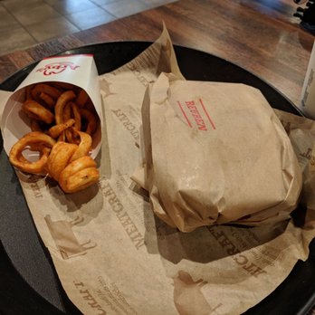 Arby's - a burger and onion rings on a plate - Fast Food Near Me - Lamont, Florida