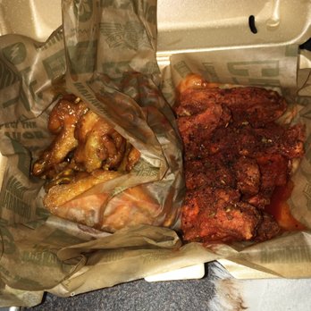 Wingstop - Left side mango habanero and in the right Cajun. Both good - Chicken Wings Near Me - Orlando, Florida Wingstop - Left side mango habanero and in the right Cajun. Both good - Chicken Wings Near Me - Orlando, Florida