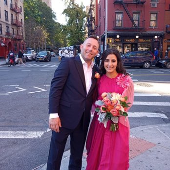 Floral Studio - a man and a woman standing on a city street - Florists Near Me - New York, New York Floral Studio - a man and a woman standing on a city street - Florists Near Me - New York, New York