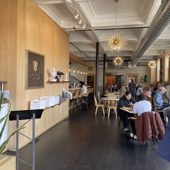 Yuca By Cedar - people sitting at tables in a restaurant - Breakfast & Brunch Near Me - Bellevue, Kentucky Yuca By Cedar - people sitting at tables in a restaurant - Breakfast & Brunch Near Me - Bellevue, Kentucky