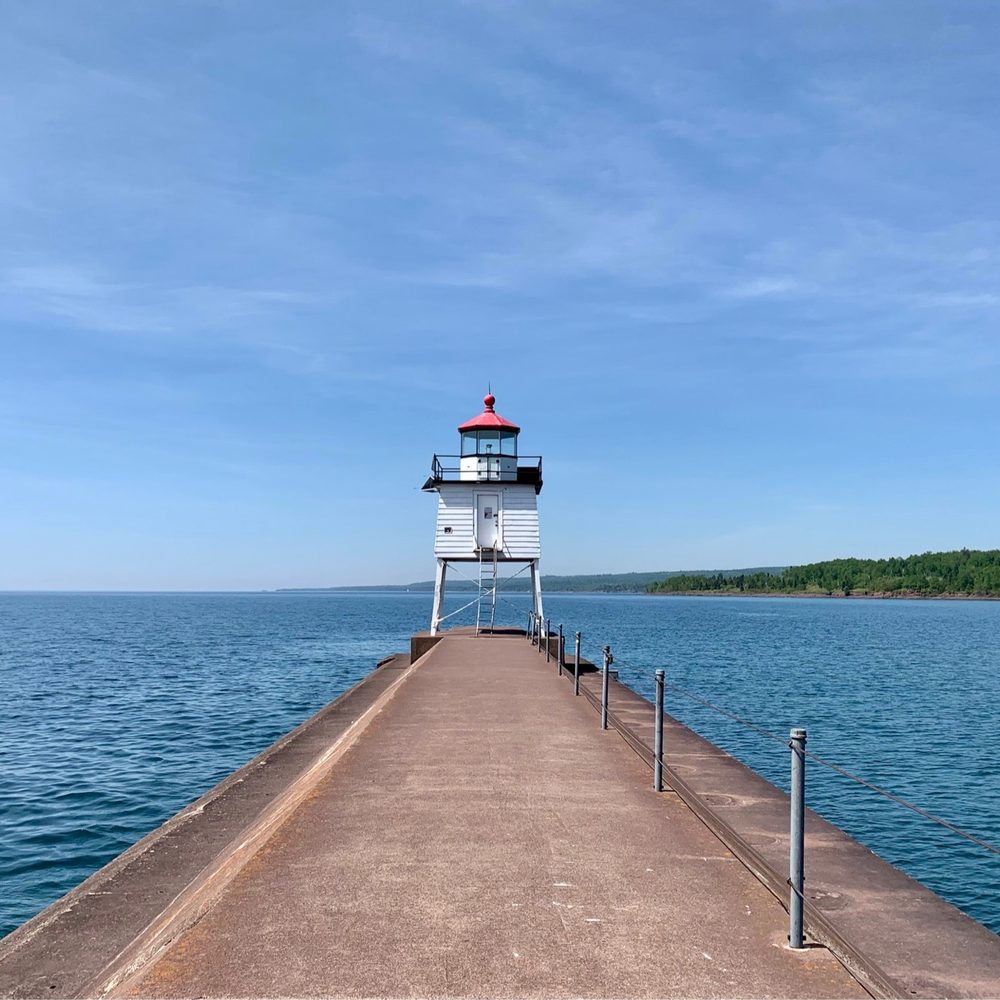 Agate Bay Beach - The pinnacle of Agate Bay is this lighthouse at the end of the pier. - Beaches Near Me - Two Harbors, Minnesota Agate Bay Beach - The pinnacle of Agate Bay is this lighthouse at the end of the pier. - Beaches Near Me - Two Harbors, Minnesota