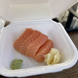 Salmon sashimi included in bento box