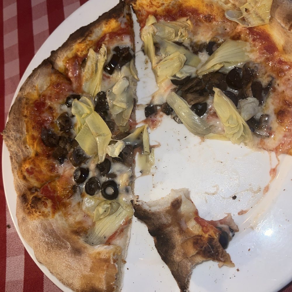 Pizza with cheese olives and artichokes Pizza with cheese olives and artichokes