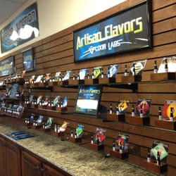 Vapor Junction - Vapor Junction Tasting Wall, featuring over 200 e-liquid flavors