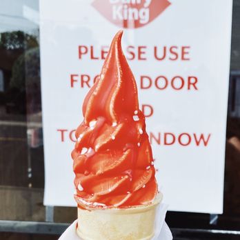 Dairy King - a hand holding an ice cream cone - Burgers Near Me - Norwalk, Connecticut